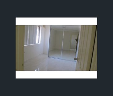 Spacious top floor Unit - Photo 1