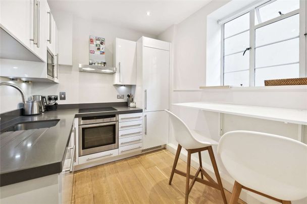 A lovely 3 bedroom flat, bright and modern in style, located on the first floor of a smart portered building in the heart of South Kensington, just off Brompton Cross. - Photo 1