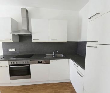 Geförderte 2 Zimmer Wohnung mit Eigengarten und Tiefgaragenplatz - ... - Photo 4