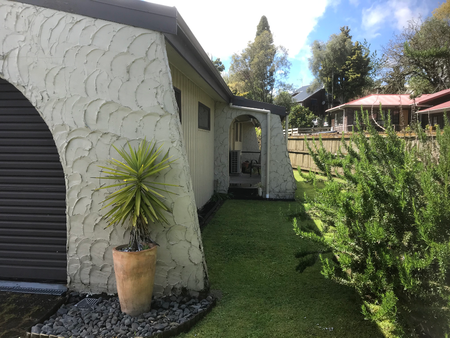 Hidden behind the very private road front hedge is a lovely 3 bedroom , one bathroom home with spacious double garage. - Photo 4