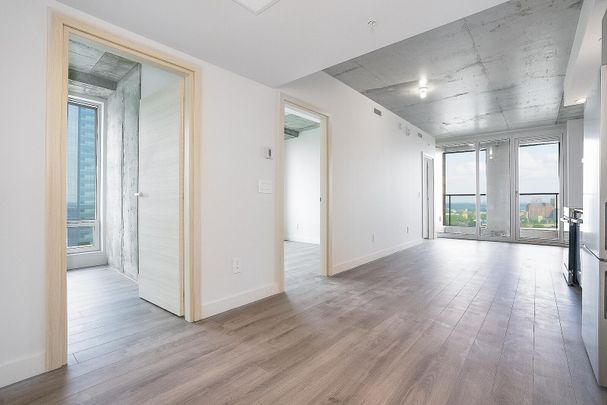 From bold architecture to sweeping skyline views, Skyla is where downtown Montréal living reaches its peak — in style - Photo 1