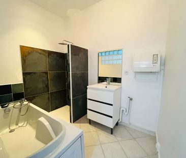 A LOUER APPARTEMENT EN RDC PROCHE CENTRE VILLE DE ST QUENTIN 02100 - Photo 3