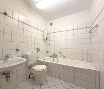 Stadtnah und ruhig – Familienfreundliche Maisonette mit Garten - Photo 3