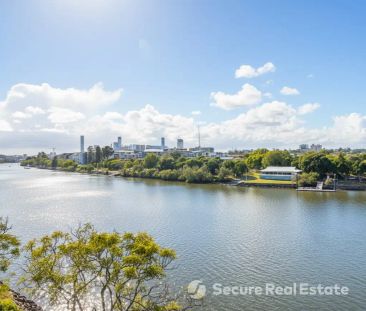 “SPACIOUS 2 BEDROOM UNIT WITH STUNNING RIVER AND CITY VIEWS” - Photo 5