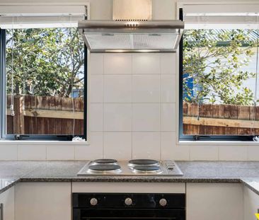 This beautifully renovated three-bedroom home in Ranui is ready for... - Photo 2