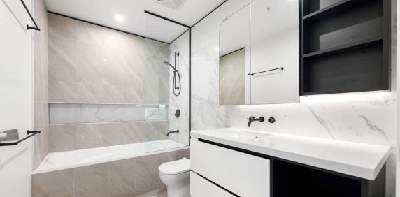LUXURY LIVING IN THE ICONIC SKYNEEDLE APARTMENTS - Photo 2