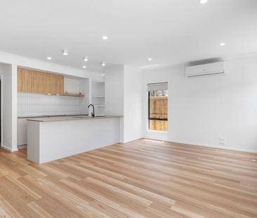 Stylish Two-Level Townhouse with Modern Comfort & Flexibility - Photo 1