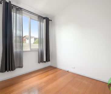 Freshly Updated Two-Bedroom Townhouse with Park Views - Photo 3