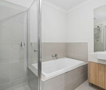 Brand New 3 Bedroom Townhome with Private Garden & Double Garage - Photo 2