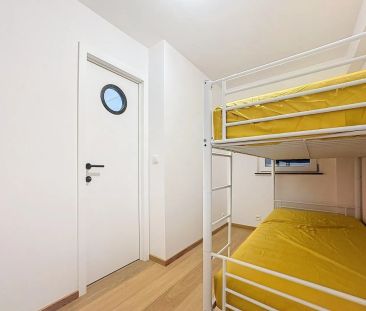 Gerenoveerd appartement met 1 slaapkamer op de zeedijk in Knokke-Heist - Photo 6