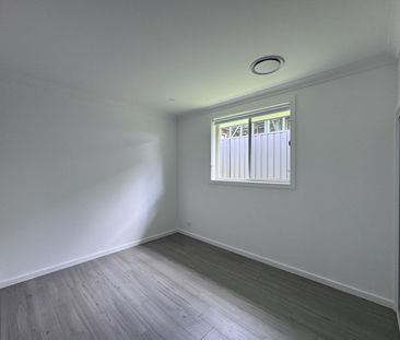 Immaculate Four Bedroom Home with Ducted Air-Con - Photo 4