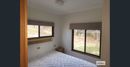 Charming Two-Bedroom Cabin with Stunning Mountain Views! - Photo 2