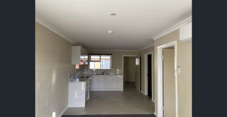 Updated unit, close to town! - Photo 5