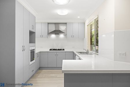 Beautifully Presented Family Home in Sought-After Middle Ridge - Photo 2