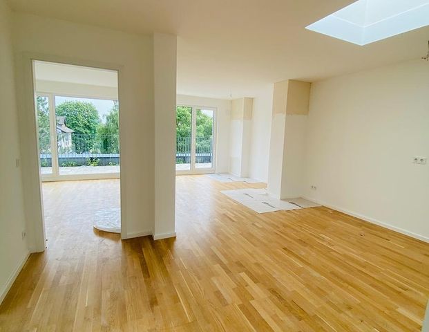 NEUBAU im Erstbezug: 2,5 Zimmer Wohnung mit EBK, Dachterrasse und Tiefgarage - Foto 1