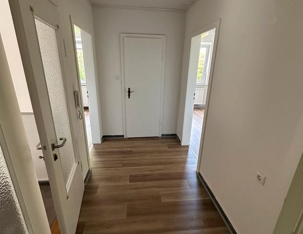 Charmante 3 Zimmer Wohnung mit Garten und Garage - Foto 1