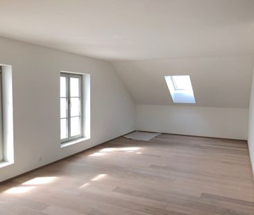 cozy 3.5 room attic apartment in the center of Wichtrach - Photo 1