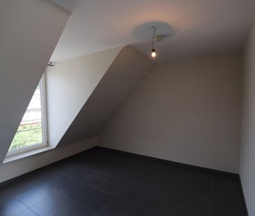 Dakappartement met 1 slaapkamer, terras en garage. - Photo 4