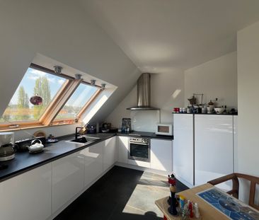 Exklusive Penthousewohnung mit direktem Rheinblick in Hitdorf bei L... - Foto 1