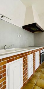 Appartement T3 de 70.39m² rez-de-chaussée en centre ville - Photo 3