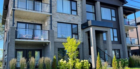 Appartement style condo 41/2 troisième étage - Photo 2