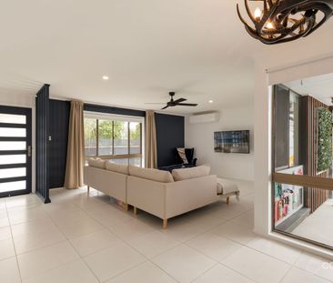 Hidden Gem on a Private Corner Block – The Ultimate Family Retreat! - Photo 1