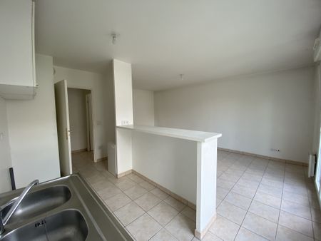 Appartement 2 pièces + parking en sous-sol - Photo 4