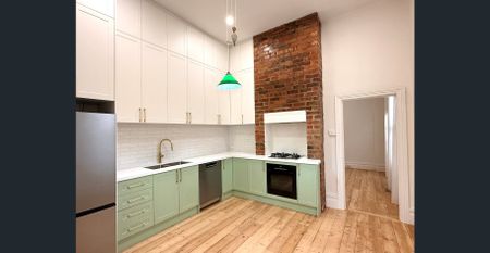 Charming Renovated Victorian with Designer Finishes & Studio Space - Photo 3