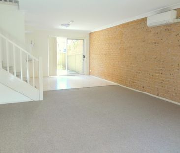 Charming Townhouse with Private Backyard - Photo 2