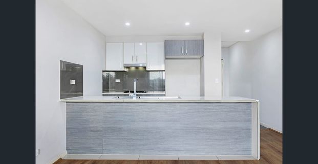 Modern Apartment in the Heart of Quakers Hill - Photo 1