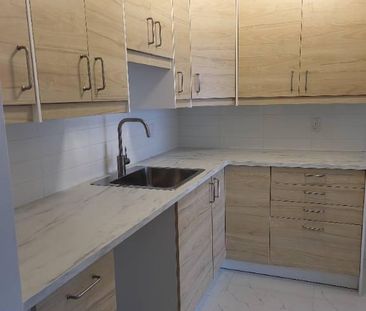 Beau grand 4 1/2 - Photo 2