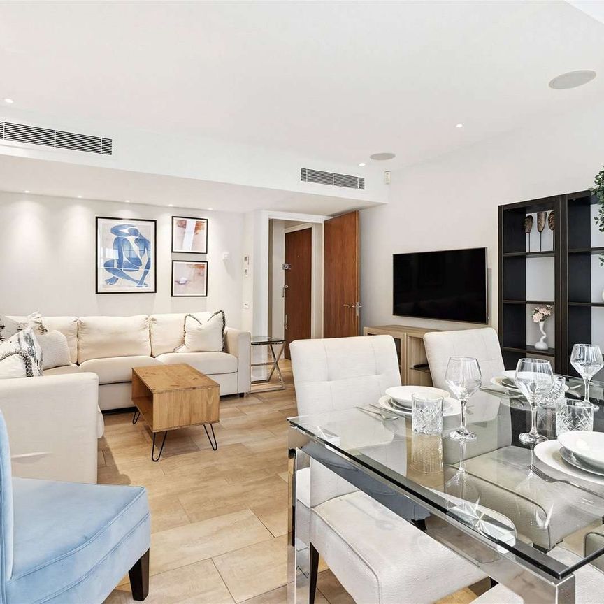 This apartment is located on the second floor of a portered building with lift service. - Photo 1