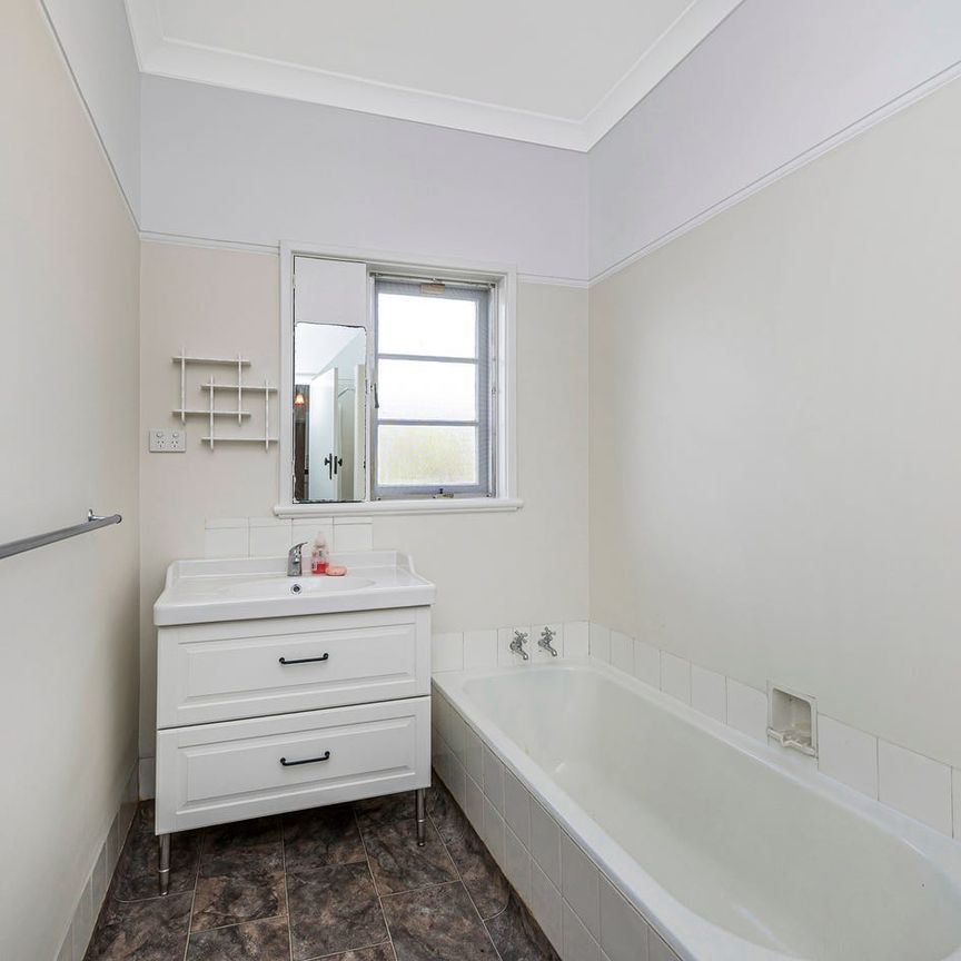 Beautiful Three Bedroom Home in Great Location! - Photo 1