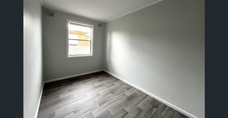 NEWLY RENOVATED AFFORDABLE HOME - Photo 3