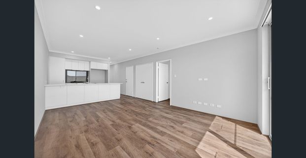 Modern Coastal Living in the Heart of Eglinton Stylish 2x2 Ready to Call Home - Photo 1
