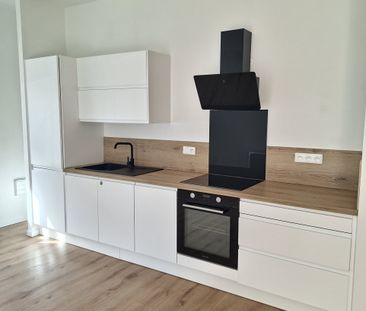 Location Appartement 2 pièces 51m² LA CHAPELLE D ARMENTIERES 59930 - Photo 2