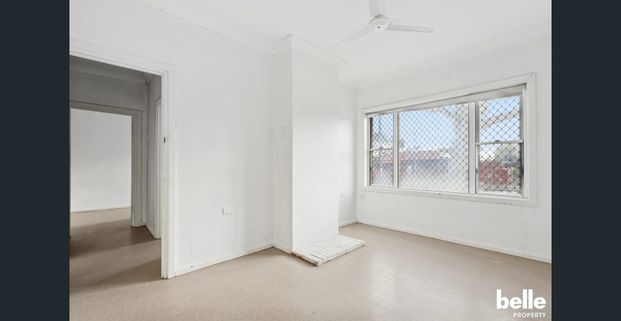 Comfortable 3-Bedroom Home with Spacious Yard in a Convenient Location - Photo 1