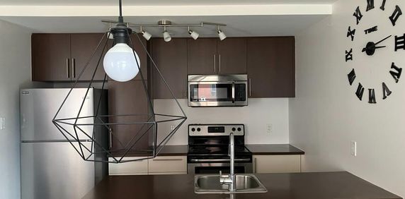 3 1/2 -condo Urbania-1er juin - Photo 2
