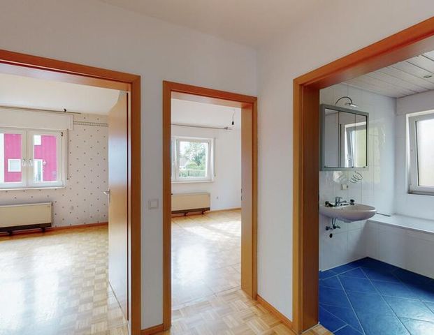 Charmante 3-Zimmer-Hochparterrewohnung mit Balkon, Garage und Gartennutzung in Au am Rhein - Foto 1