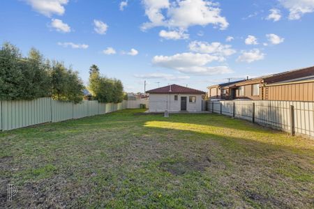 Neat 3-bedroom home on large block with a location to match. - Photo 2