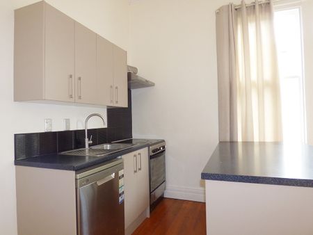 Converted Bungalow with Character Features, includes water & lawns - Photo 5