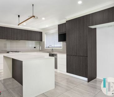 Modern 4-Bedroom Family Home in Prime Albion Park Location - Photo 3