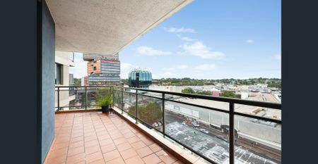 Stylish Double Brick Apartment with Views & Convenience - Photo 3