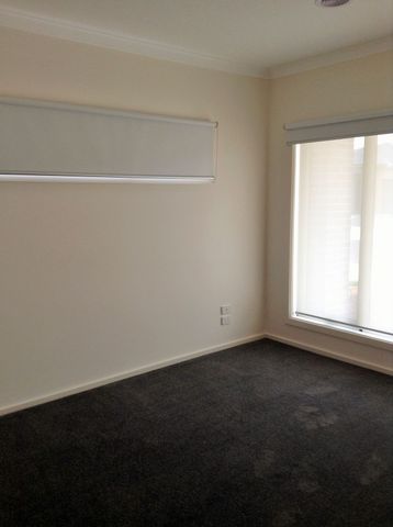 AS NEW THREE BEDROOM HOME - Photo 3