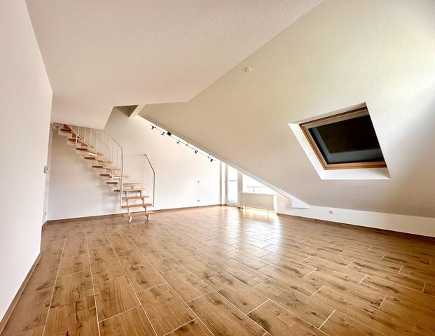 Ansprechende Maisonette-Wohnung mit Einbauküche und Loggia in zentraler Wohnlage - Foto 1