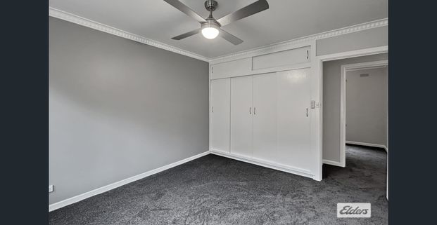 A beautifully renovated four-bedroom home - Photo 1