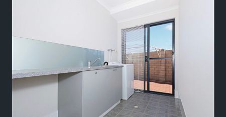 Modern Family Home with Multiple Living Areas & Side Access - Photo 2