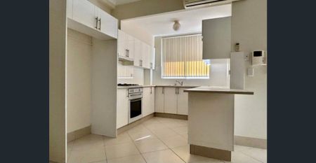 ""TWO BEDROOM SPLIT LEVEL APARTMENT WITH LOCK UP GARAGE"" - Photo 5