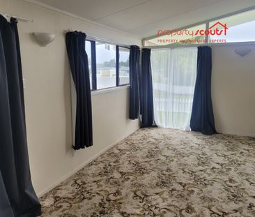 Spacious 4-Bedroom Home - Photo 1