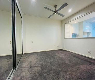 ONE BEDROOM WITH ENCLOSED BALCONY AND SECURED PARKING - Photo 2